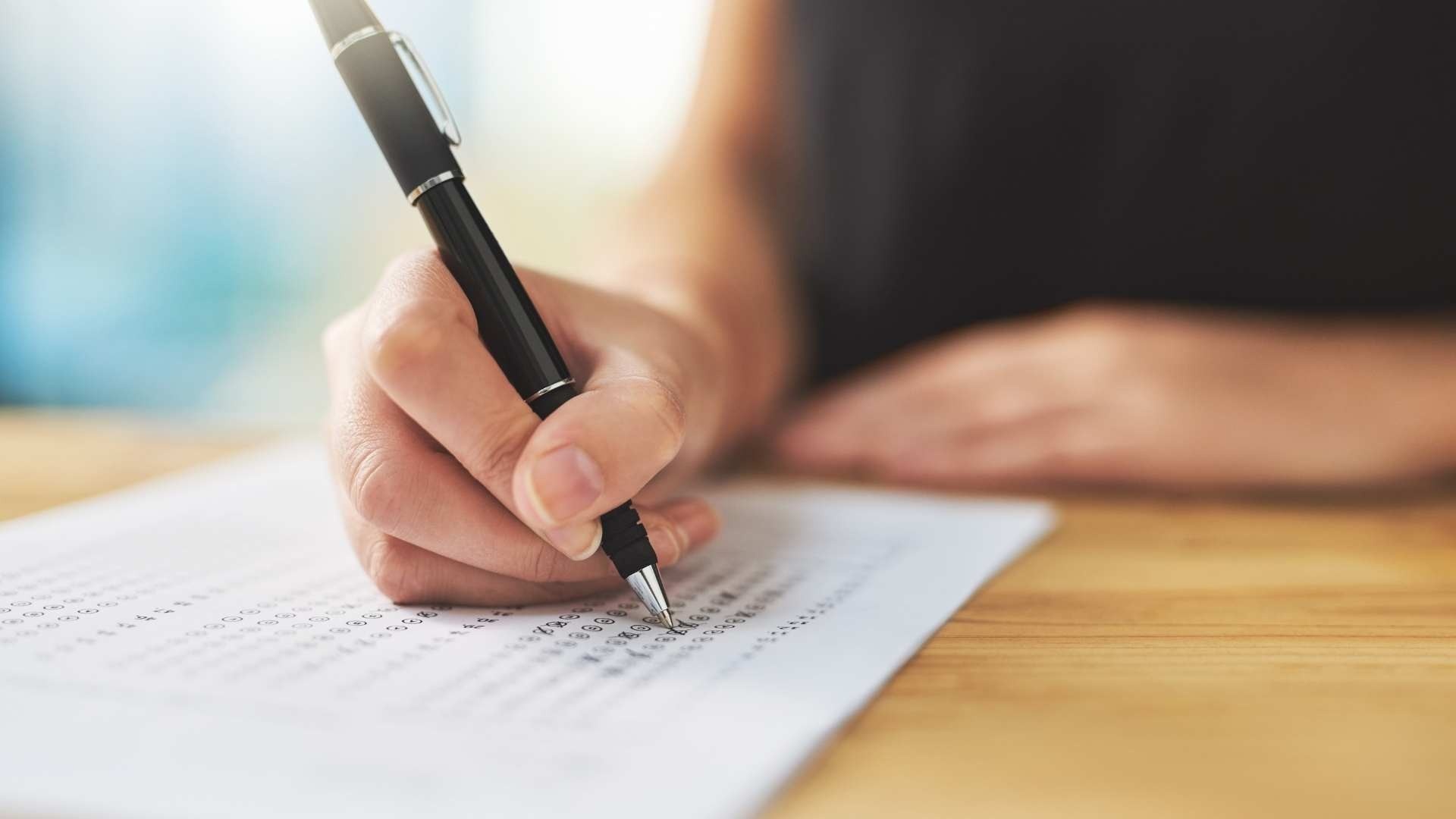 Image of a person answering an evaluation.